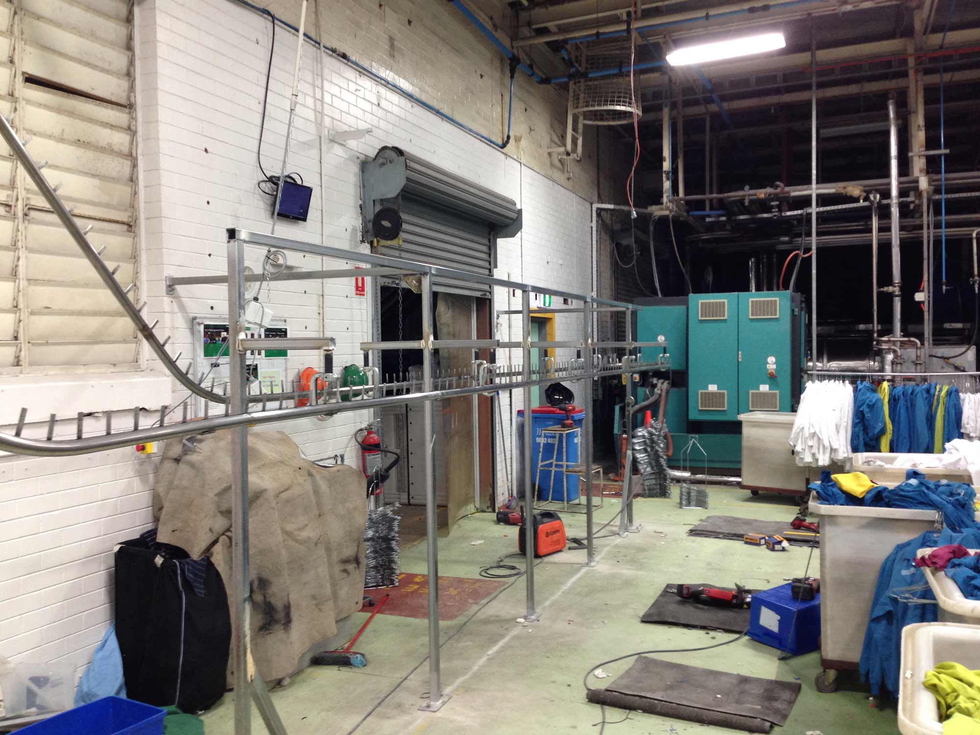 Completion of tunnel conveyor fit out. Alsco, Sydney, NSW