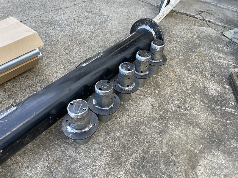 Flag pole components fabricated and welded ready for galvanising.