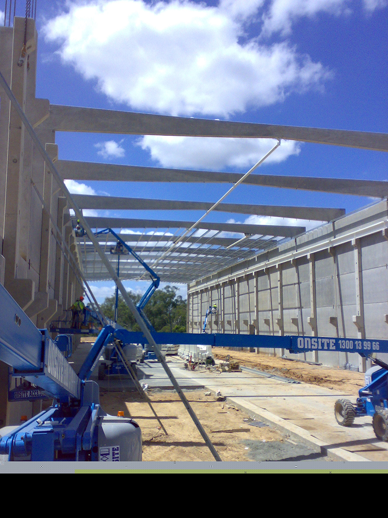 Tilt panel tie in and crane rail install.