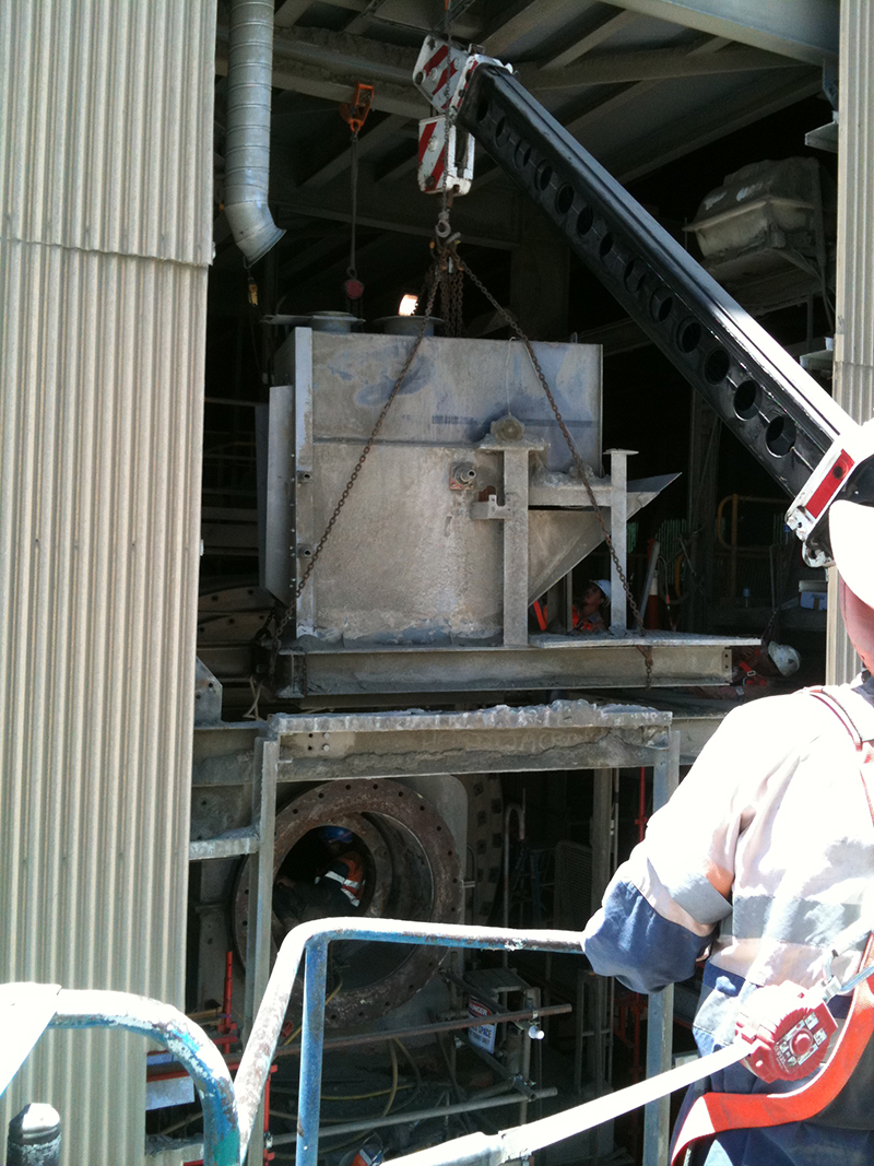 Removing hopper for repairs.