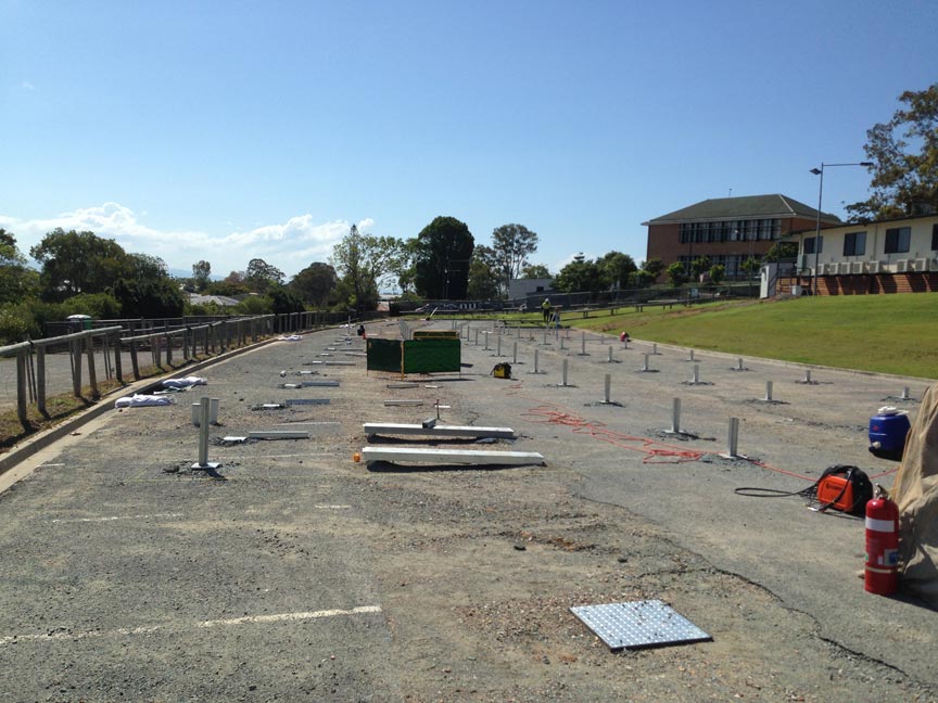 Installing Rails to screw piles for demountable building.